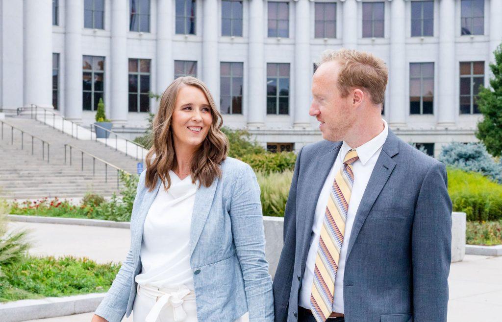 Attorneys Jennifer Simpson Esq and Rhett Buckley Esq of Buckley Simpson Law discussing a case at the city and county of denver courthouse.